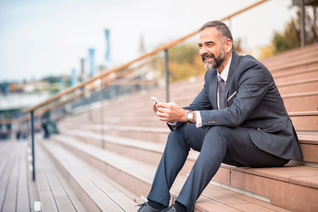 Senior businessman relaxing in an urban area.