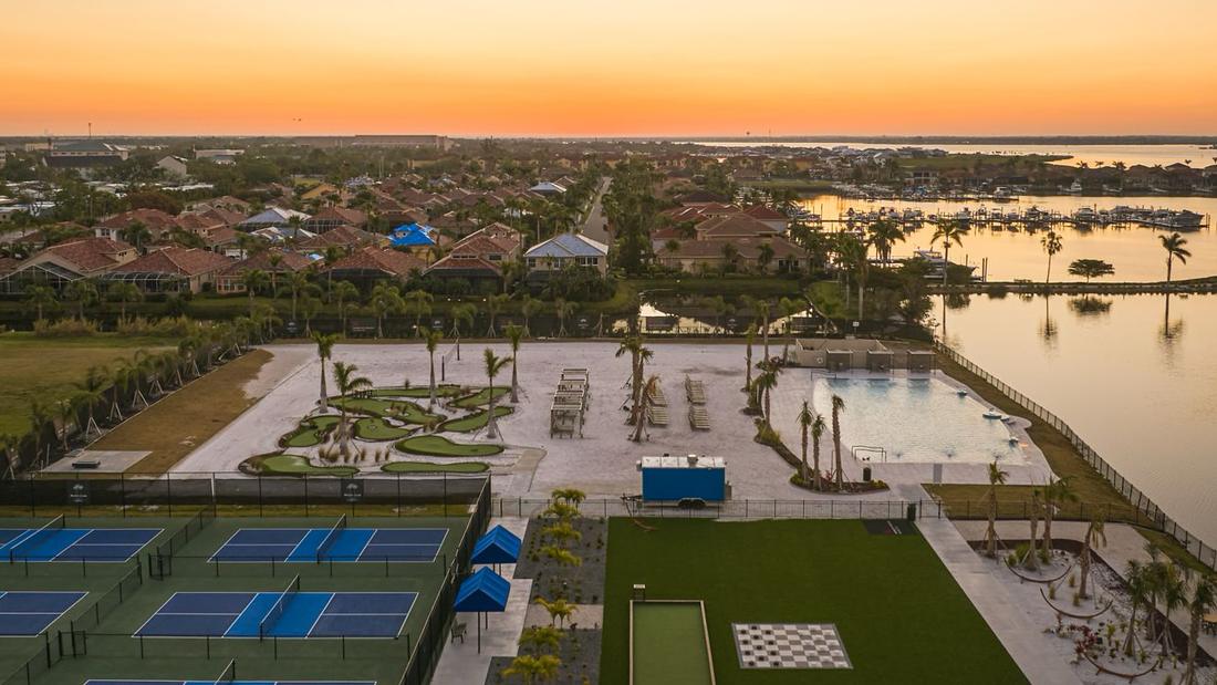 The resort grounds and waterfront at sunset